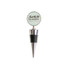 A wine stopper with a silver metal base, a black rubber grip, and a round glass top featuring a logo.