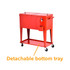A bright red cooler box trolley with a detachable bottom tray and wheels, featuring a side handle and a tap.