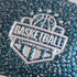 A textured mini basketball in teal with metallic accents and an embossed logo.