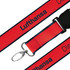 A red woven lanyard featuring black accents and a metal attachment clip. It has branding elements.