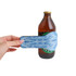 A drink bottle with a custom shape slap stubby holder, featuring a blue design and wrapped around the bottle.