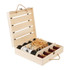 A wooden wine box in a light colour, containing four wine bottles and filled with straw. Features a logo on the side. A wooden wine box in a light colour, containing four wine bottles and filled with straw. Features a logo on the side.