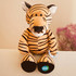 A plush tiger toy in orange and black stripes, featuring a white muzzle and a logo on the bottom of its feet.