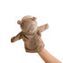 A brown plush hippopotamus hand puppet with small ears and arms, held up by a hand.