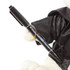 A plush bear wearing a graduation gown, holding a black permanent marker. It has a logo on the gown.