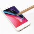 A bamboo pen with a stylus nib is poised above a smartphone screen, showcasing its natural colour and sleek design. A bamboo pen with a stylus nib is poised above a smartphone screen, showcasing its natural colour and sleek design.