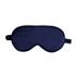 A satin sleep mask in navy blue with an elastic strap and a smooth texture. It features a logo on one side.