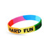 A multicoloured silicon wristband featuring a logo, with vibrant sections of pink, blue, yellow, and green. A multicoloured silicon wristband featuring a logo, with vibrant sections of pink, blue, yellow, and green.