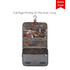 A travel hanging toiletry bag in grey, featuring an intricate patterned inner lining and a hook for hanging.