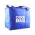 A blue non-woven cooler bag with two handles and a logo on the front.