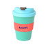A reusable coffee cup in teal with a coral grip and a blue lid, featuring a logo.