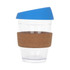 A drink bottle featuring a clear body, blue lid, and a brown cork band for grip. It has a logo on the side.