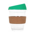 A reusable glass coffee cup with a cork band and a green silicone lid, featuring a clear glass body.