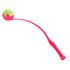 A pink ball thrower with a curved arm and a tennis ball attached at the end. It has a textured handle for grip. A pink ball thrower with a curved arm and a tennis ball attached at the end. It has a textured handle for grip.