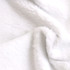 A soft, fluffy white flannel blanket with a luxurious texture. Features a subtle sheen.