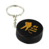 A black hockey puck stress reliever attached to a metal keyring, featuring a silhouette and gold text. A black hockey puck stress reliever attached to a metal keyring, featuring a silhouette and gold text.