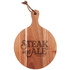 A round wooden cheeseboard with a handle, featuring a logo and a natural finish.