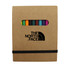 A notepad set in a brown cardboard cover with an elastic band, featuring colourful markers inside. It has a logo on the front.