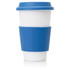 A ceramic travel mug in white with a blue silicone sleeve and lid. It features a logo.