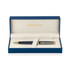 A matte black ballpoint pen with gold accents, presented in a blue gift box with a plush interior.