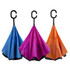 Three double canopy umbrellas in blue, magenta, and orange with curved handles and branding.
