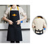 A black poly-cotton canvas apron with a yellow neck strap, featuring a logo and pockets on the front.