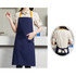 A navy blue poly-cotton canvas bib apron with a yellow neck strap and a front pocket, featuring a logo.