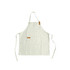 A cream-coloured poly-cotton canvas full bib apron with a neck strap and a front pocket. It features a logo.