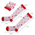 Compression socks in white with red accents, featuring medical-themed patterns. Two pairs are folded beside them.