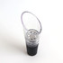 A wine aerator in clear plastic with a black base, featuring a perforated insert for aeration.