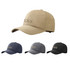 A beige quick-drying perforated cap along with navy, grey, and black versions. Each cap has a logo.