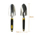 A garden hand tool set featuring a trowel and hand spade with yellow and black grips. The tools are metallic.