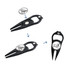 A black golf divot tool features a ball marker and a bottle opener, showcasing its multifunctional design.