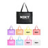 A black transparent mesh tote bag with a logo, surrounded by tote bags in purple, pink, yellow, and orange.