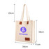 A cream canvas bag with a magnetic snap, leather accents, and a logo on the front, measuring 20cm by 34cm by 38cm.