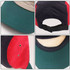 A lightweight 5 panel flat bill cap featuring green, red, and navy panels, with a logo and adjustable strap at the back.
