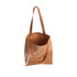 A brown cork tote bag with a white tree design and tan handles. It has an internal compartment and a logo.