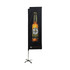 A tall rectangular banner featuring a bottle of beer on a black background, with a stand for display.