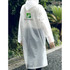 A clear, reusable EVA raincoat with a hood, featuring a logo on the back and set against a lush outdoor background. A clear, reusable EVA raincoat with a hood, featuring a logo on the back and set against a lush outdoor background.