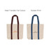 Two canvas tote bags are displayed: one with maroon handles and lettering, and another with blue handles and lettering. Both are beige.
