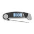 A digital instant read meat thermometer in silver and black with a large display and a metal probe.