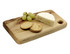 A wooden cheese board featuring a wedge of cheese, crackers, and green grapes. The board has a rounded edge and a hole.