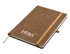 A brown bonded leather A5 notebook with an elastic band and a logo on the cover.