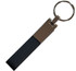 A key holder featuring a sleek black leather strap and a metallic keyring attachment. A key holder featuring a sleek black leather strap and a metallic keyring attachment.