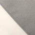 A close-up of a grey non-woven material, showcasing its texture and stitching details.