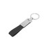 A PU leather keyring in black with a metal attachment and a circular keyring. Features a logo on the metal part.