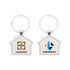 A metal keyring shaped like a house, featuring two logos in brown and blue on either side.