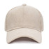 A corduroy baseball cap in a light beige colour with a curved brim and a textured design. It has a logo.