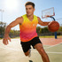 A male basketball player wearing a vibrant yellow and pink gradient V-neck singlet, holding a basketball on a court.