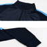 A high stand-up collar quarter-zip raglan jacket in navy blue with light blue accents and a logo.